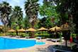 Arumeru River Lodge Hotelpool und Garten