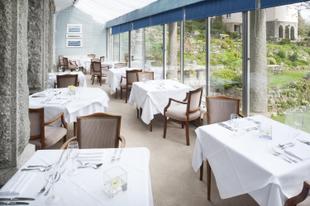 Restaurant mit traumhaftem Blick in den Garten