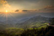 Sonnenaufgang über den Reisterrassen in Longji